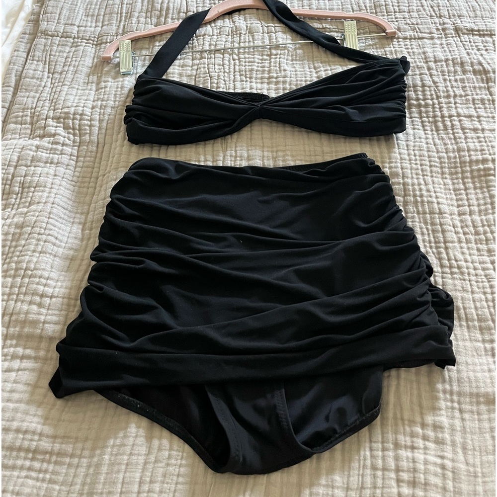 Norma Kamali , OMO swimwear line . It is ruched , can be worn for evening also.